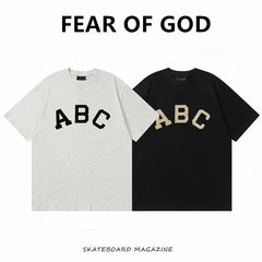ESSENTIALS FEAR OF GOD Kaos lengan pendek original merek streetwear fashion dengan model super oversized (sangat longgar).FG-9702
